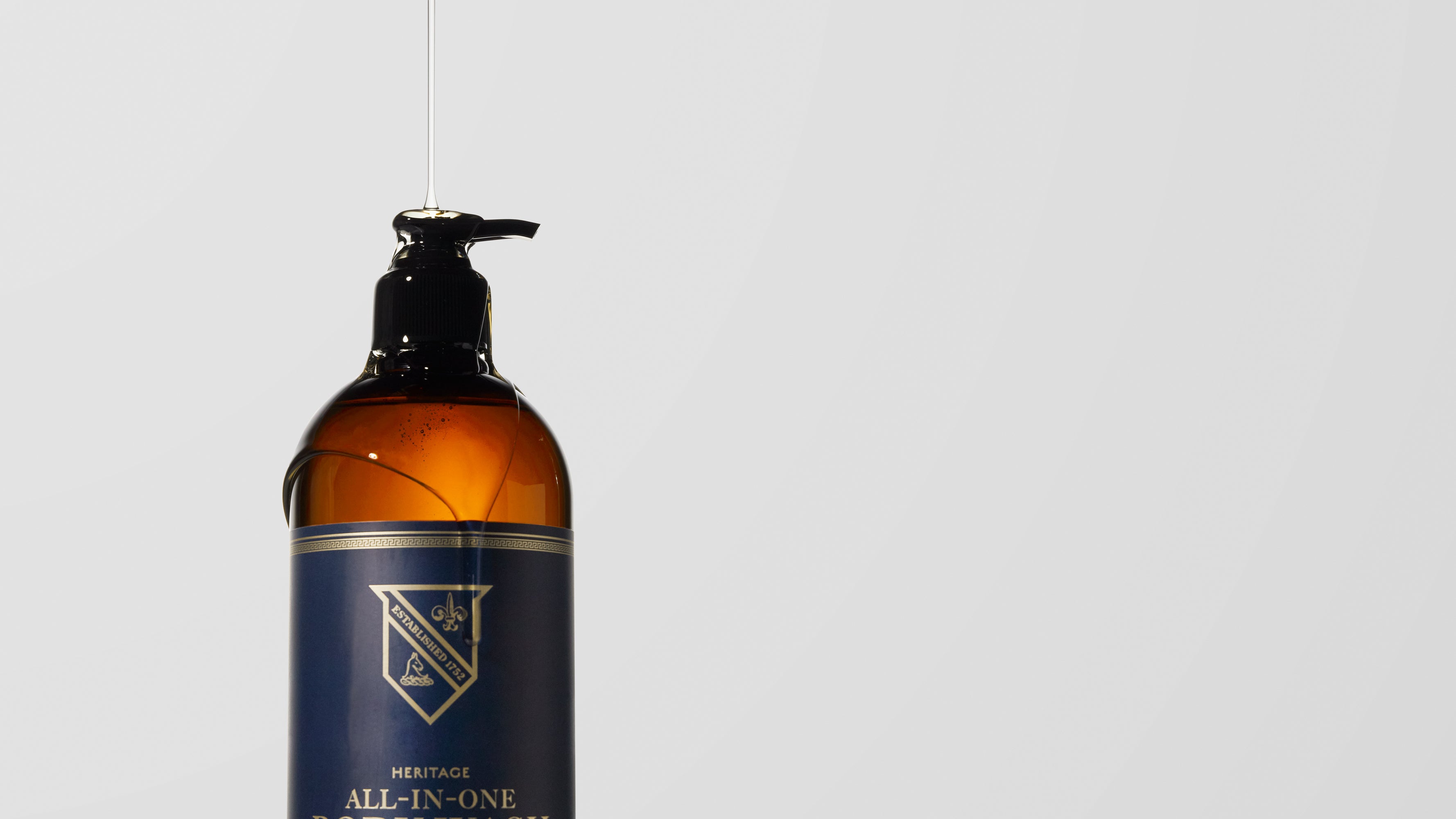 Caswell-Massey Heritage All-in-One Body Wash, showing 32oz bottle with pump