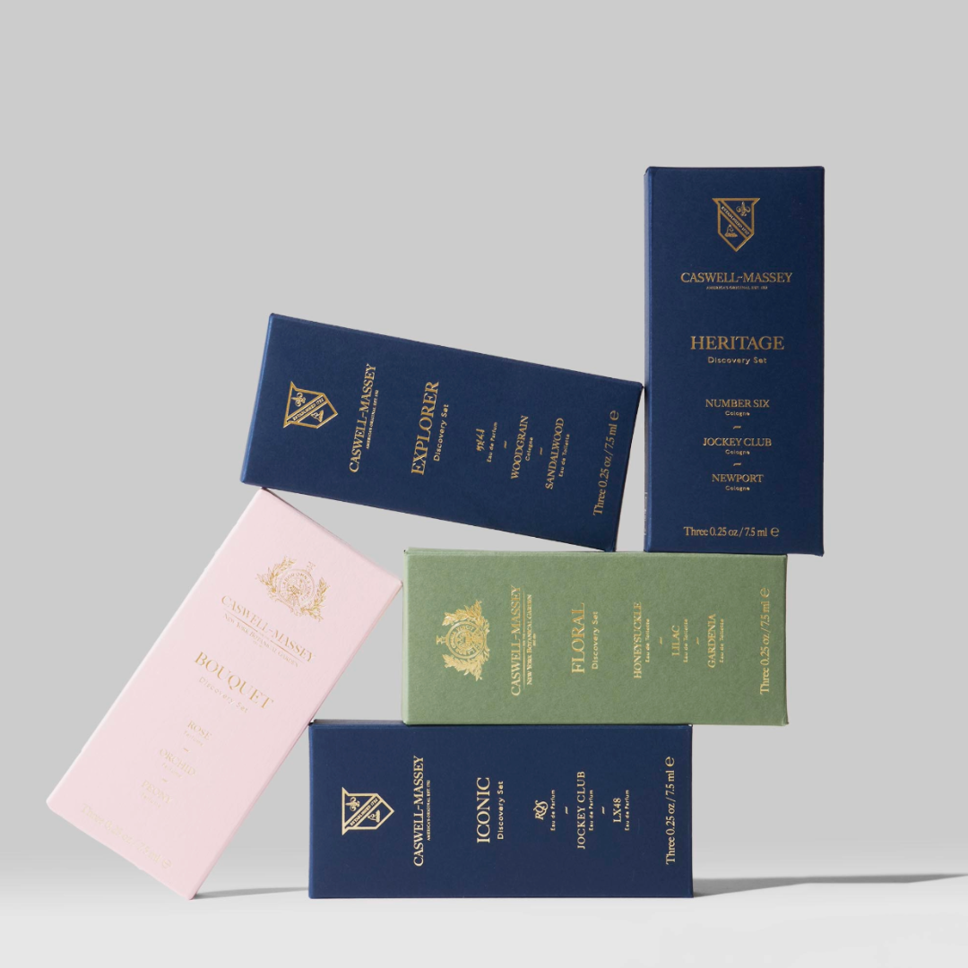 Caswell-Massey Fragrance Discovery Sets. 5 Discovery Sets shown stacked on one another.