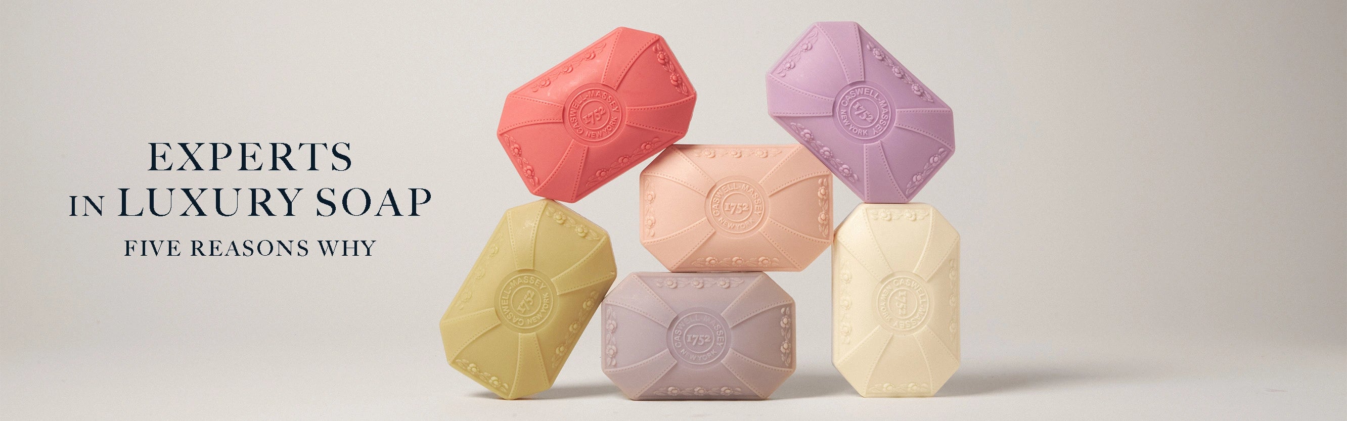 Caswell-Massey: Experts in Luxury Soap, Five Reasons Why. Image shows Caswell-Massey floral bar soaps stacked on one another.