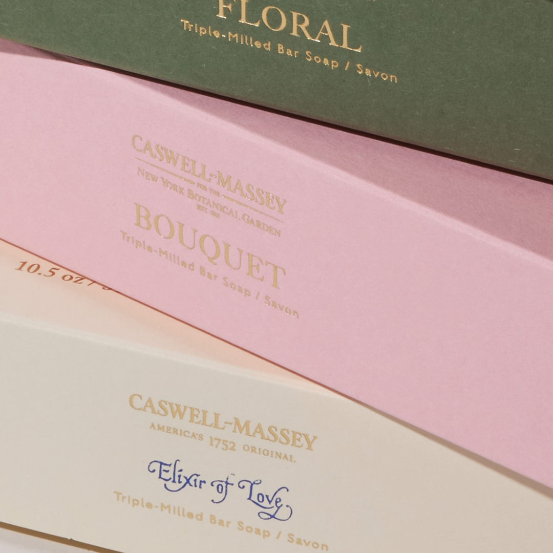 Close-up of Caswell-Massey 3-Soap Gift Sets: Elixir of Love, Bouquet, and Floral Soap Sets stacked