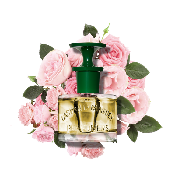 a bottle of perfume with flowers