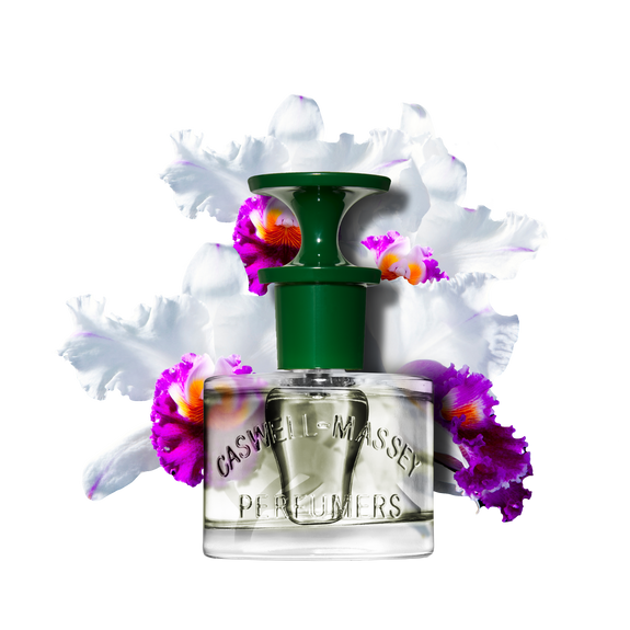 a bottle of perfume with flowers