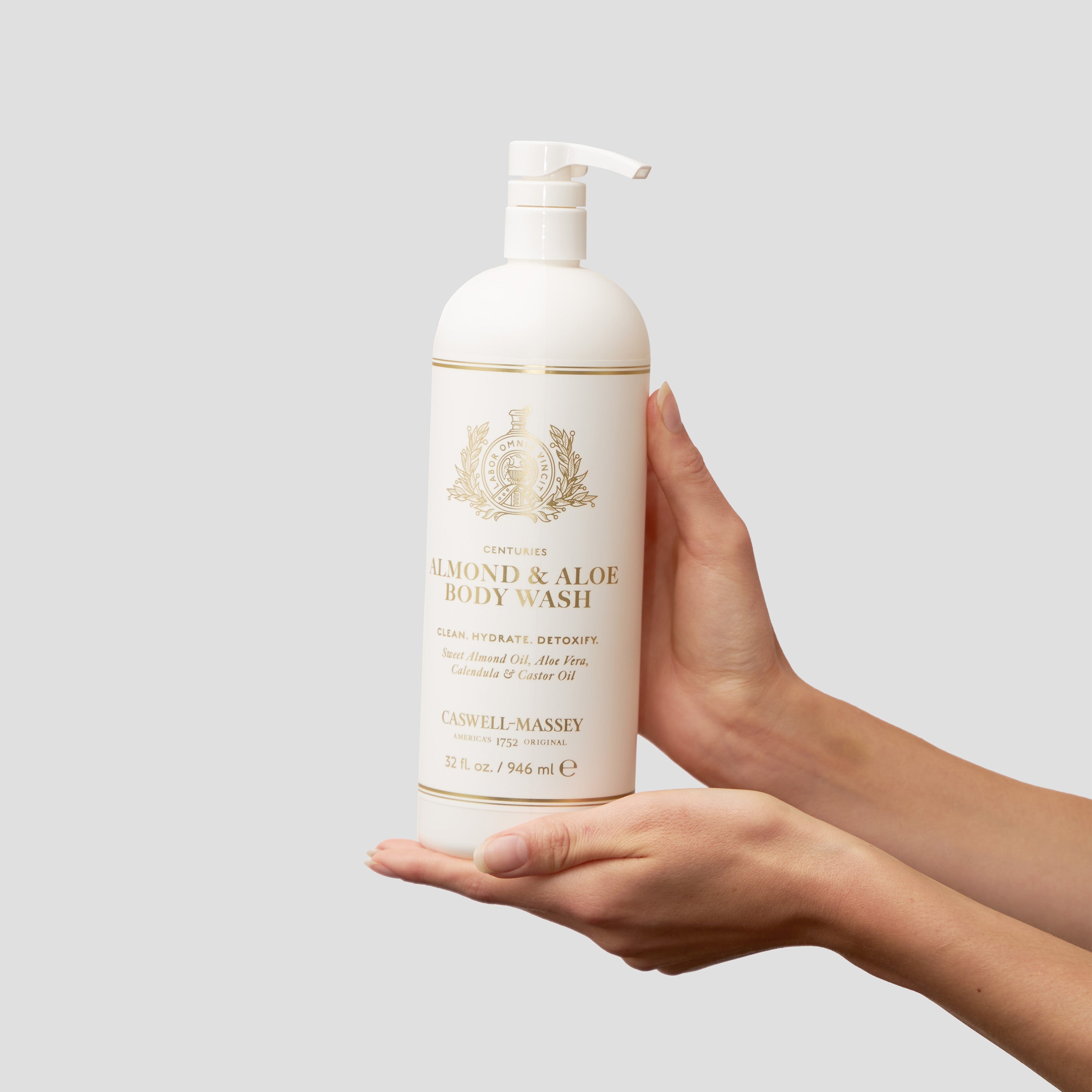 Almond and Aloe Body Wash held in hand