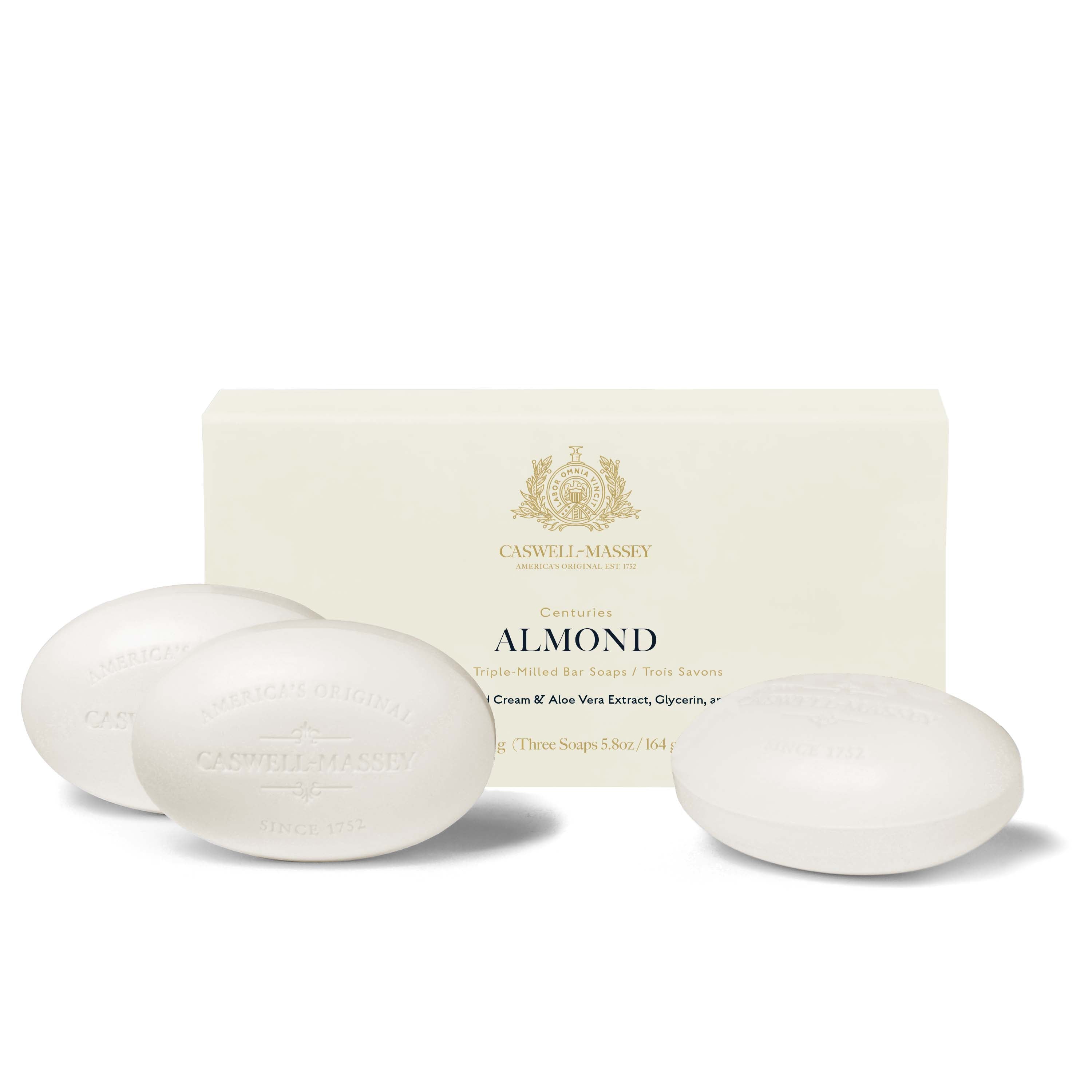 Caswell-Massey® Centuries Almond 3-Soap Set shown next to cream gift box alongside white bars of soap