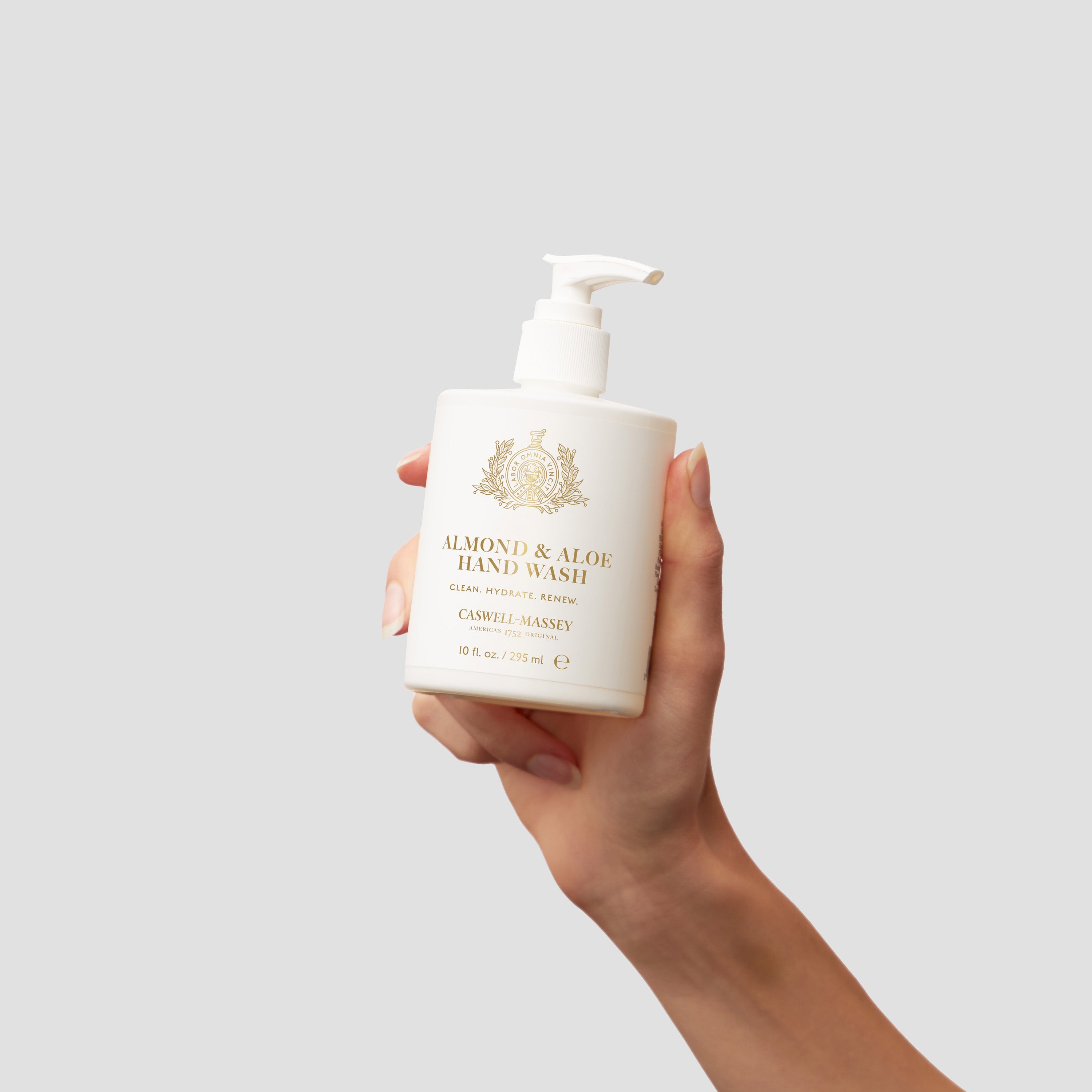 Caswell-Massey Almond and Aloe Hand Wash, 10oz shown with almonds