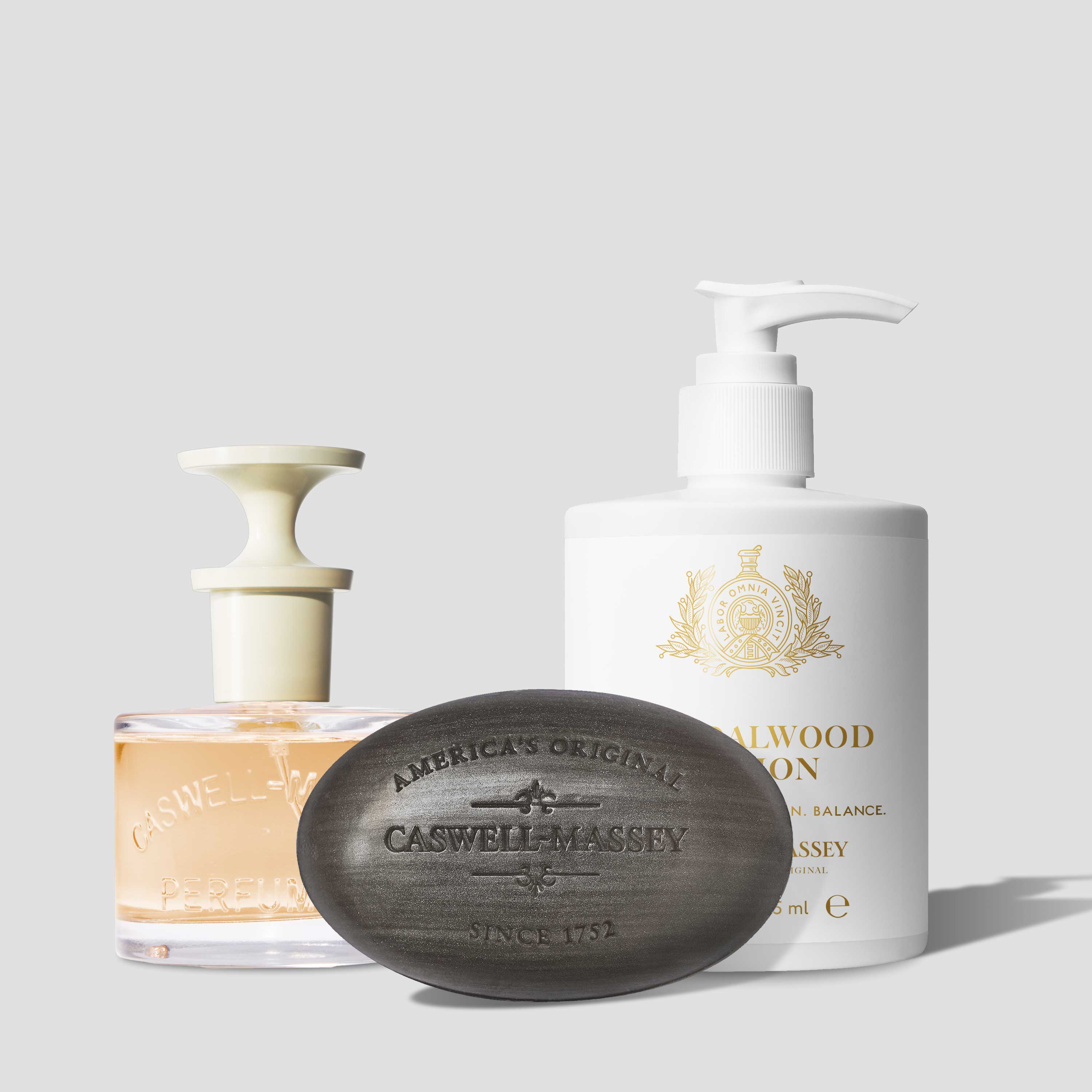 Caswell-Massey Sandalwood Collection featuring Sandalwood Eau de Toilette, Sandalwood Luxury Bar Soap, and Sandalwood Lotion for hands and body