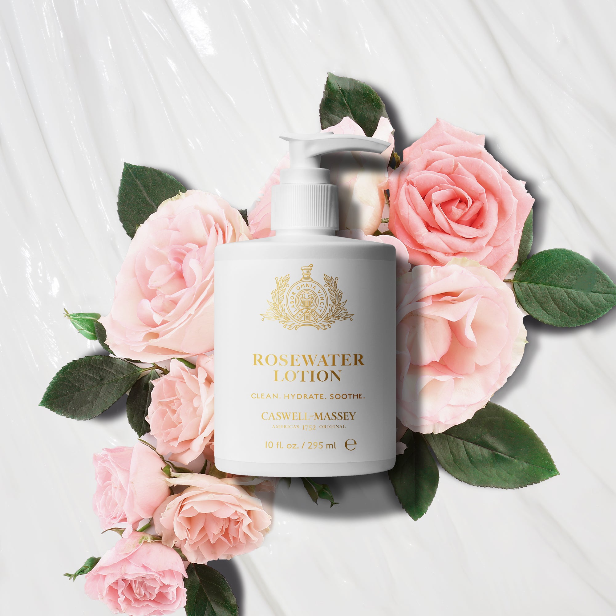 Caswell-Massey Rosewater Hand and Body Lotion 10oz pump bottle, shown with roses