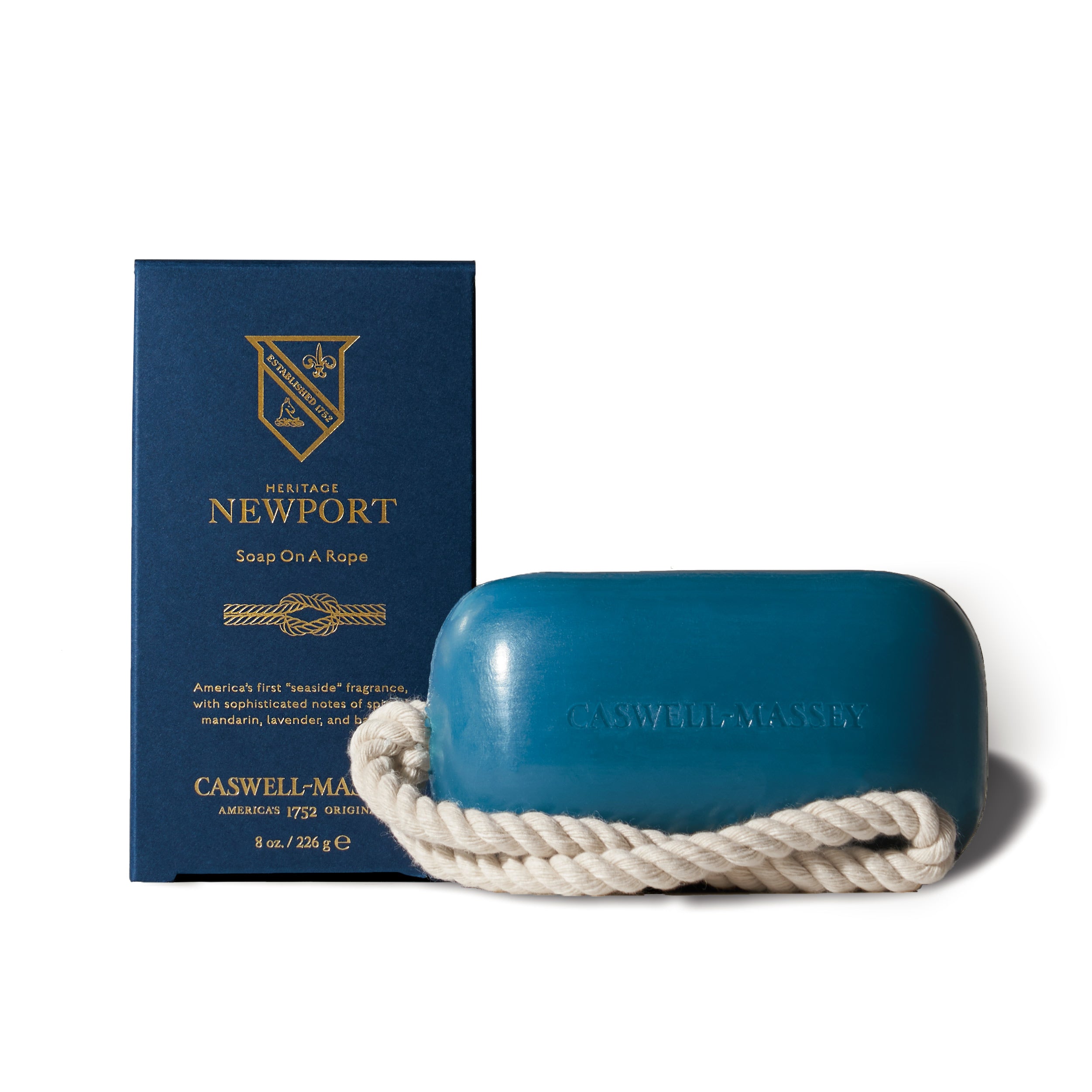 Caswell-Massey Newport Soap-on-a-Rope: navy blue soap with white rope shown next to blue box