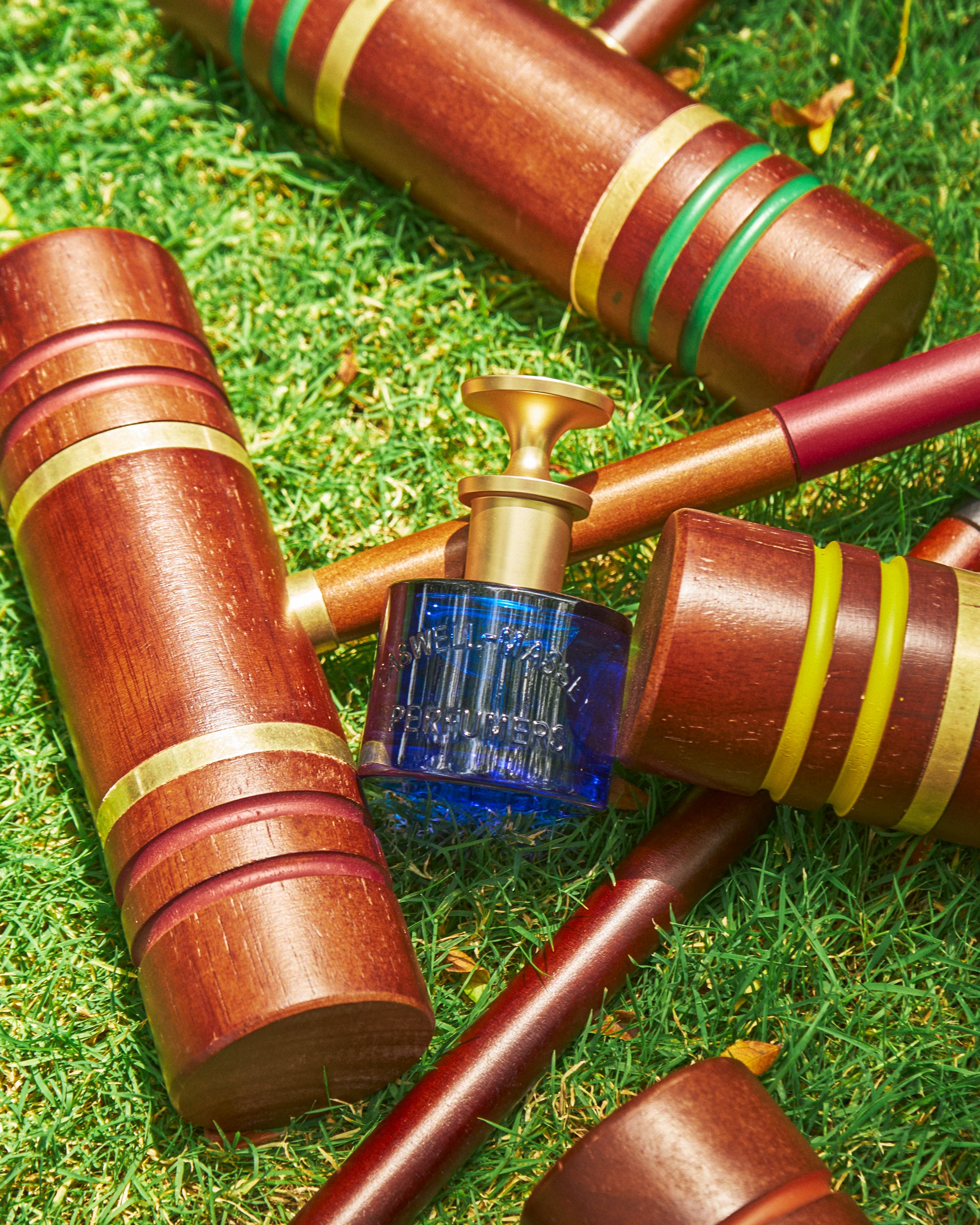 Caswell-Massey Elixir of Love Eau de Toilette shown with croquet set