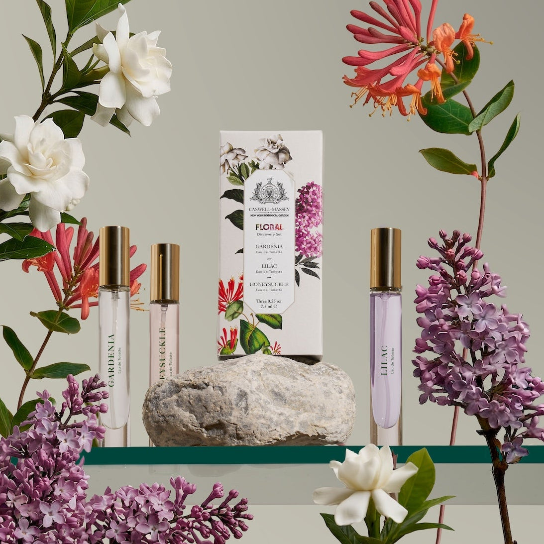 Caswell-Massey Floral Discovery Set: 7.5ml discovery wands with floral elements on a shelf against a neutral background