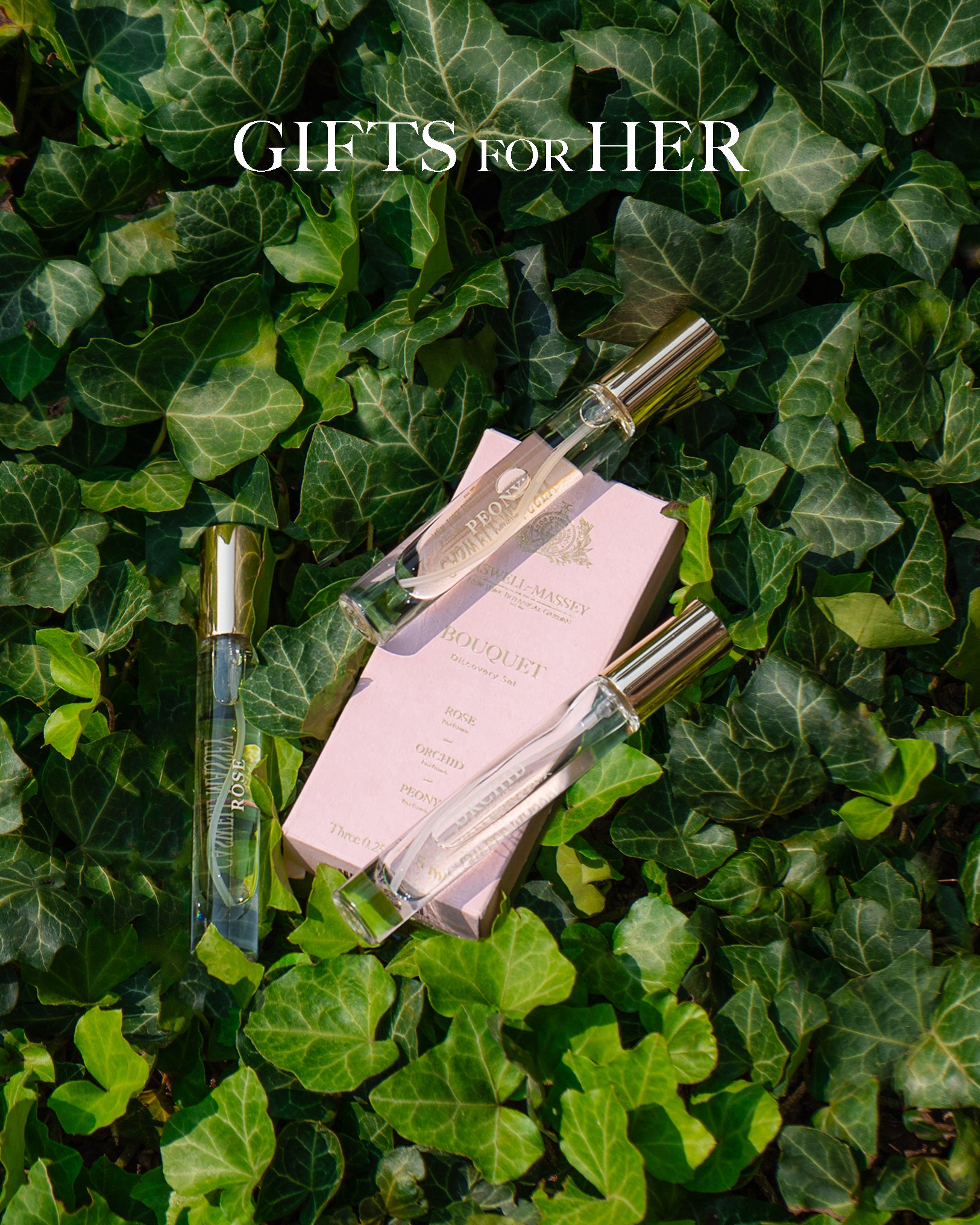 Caswell-Massey Gifts for Grads, Gifts for Women. Image shows the Bouquet Fragrance Discovery Set sitting in bed of ivy leaves