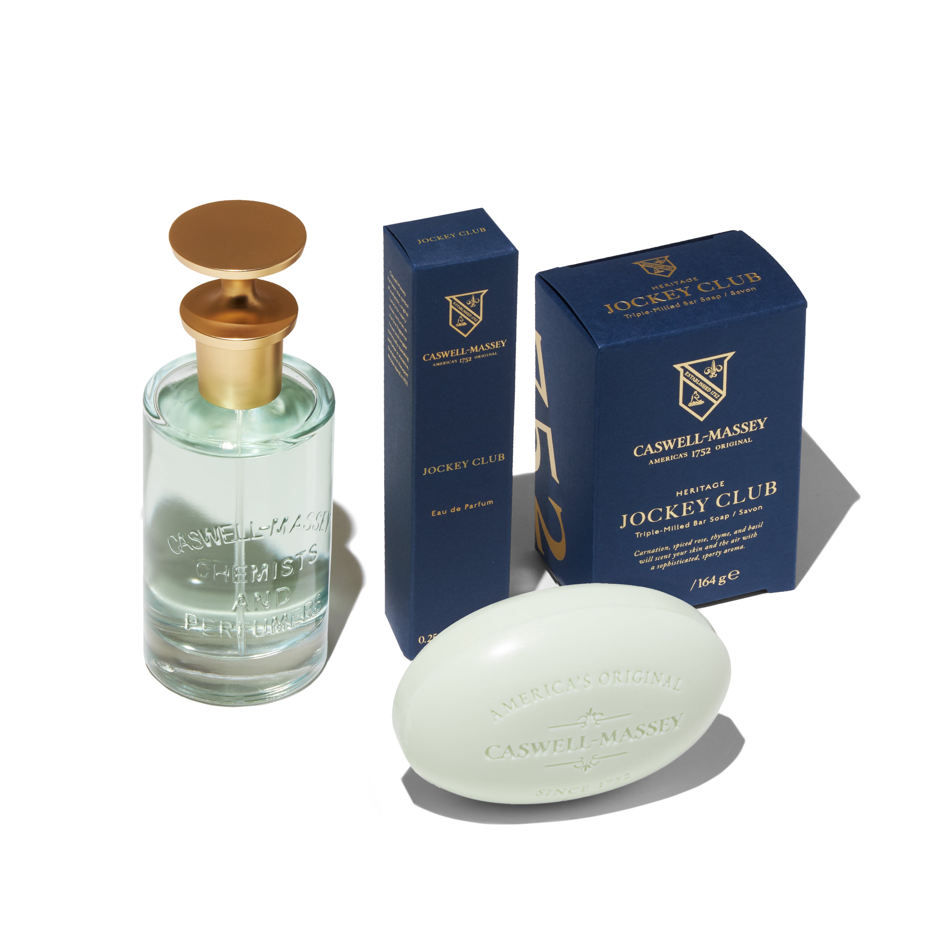 Caswell-Massey Jockey Club Eau de Parfum for Men: Image showing full-size 100ml, travel-size 7.5ml, and Jockey Club Bar Soap (green) all together