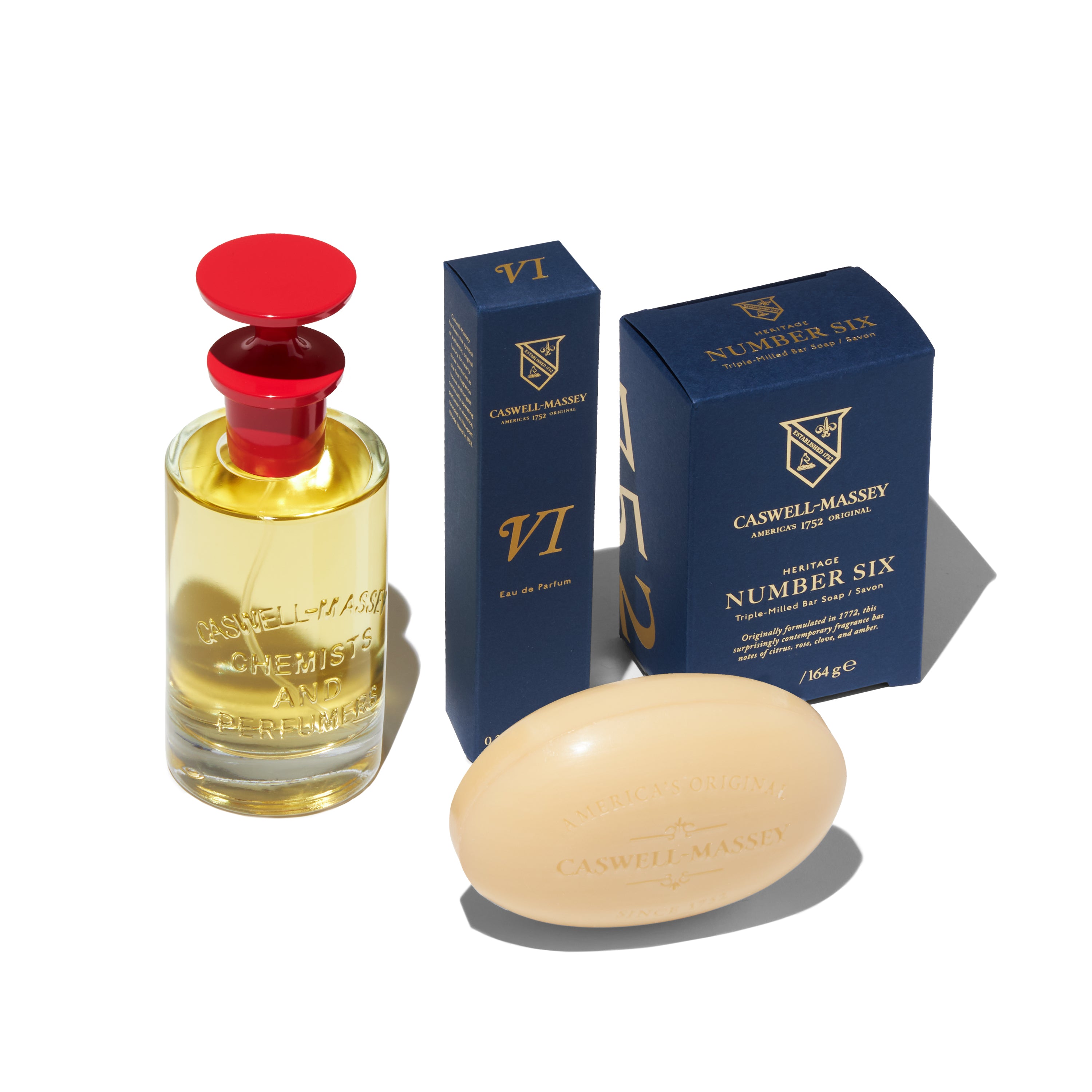 Caswell-Massey Number Six Eau de Parfum showing full-size 100ml, travel-size 7.5ml, and Number Six Bar Soap