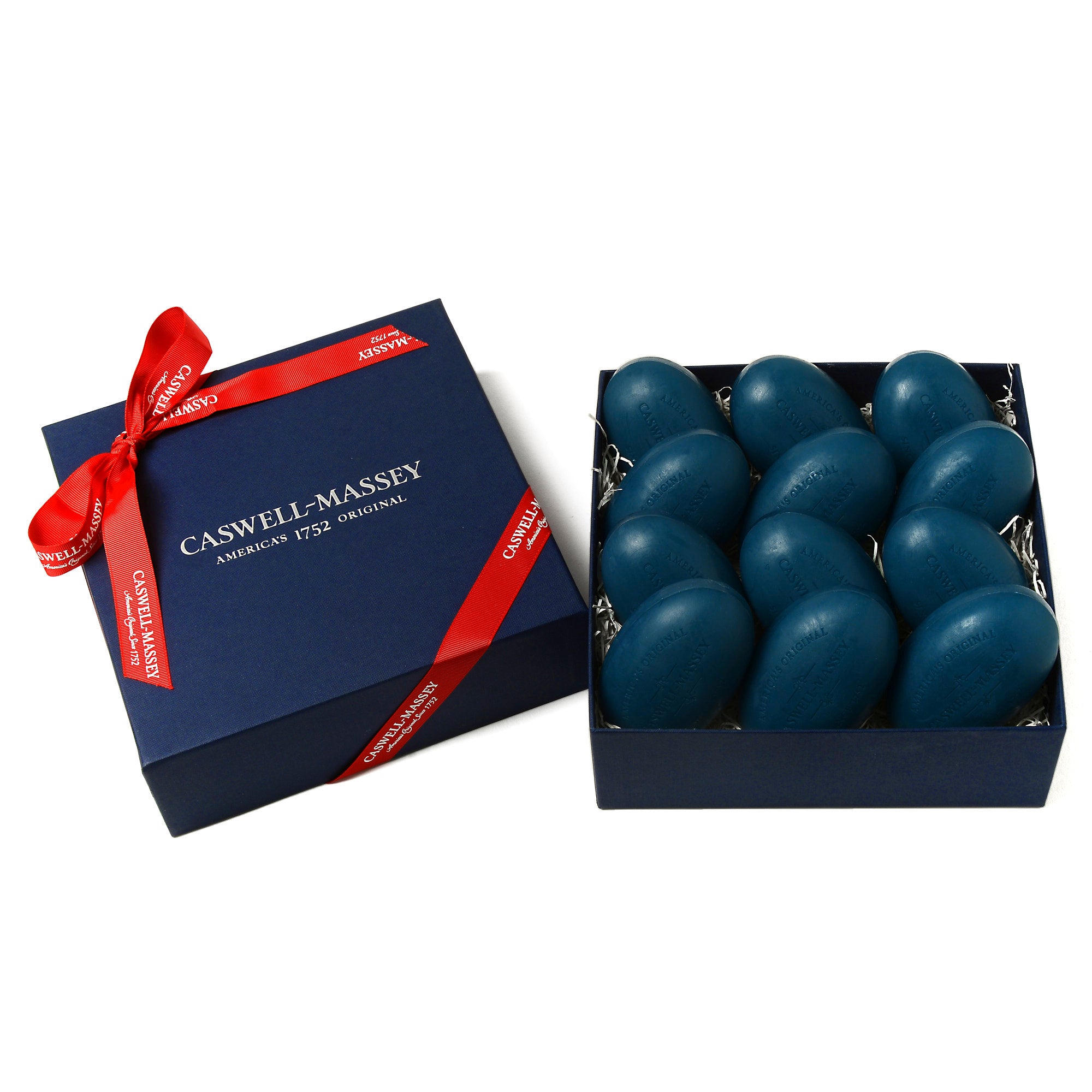 Caswell-Massey® Heritage Newport Year of Soap 12-bar set shown with navy blue gift box and red ribbon